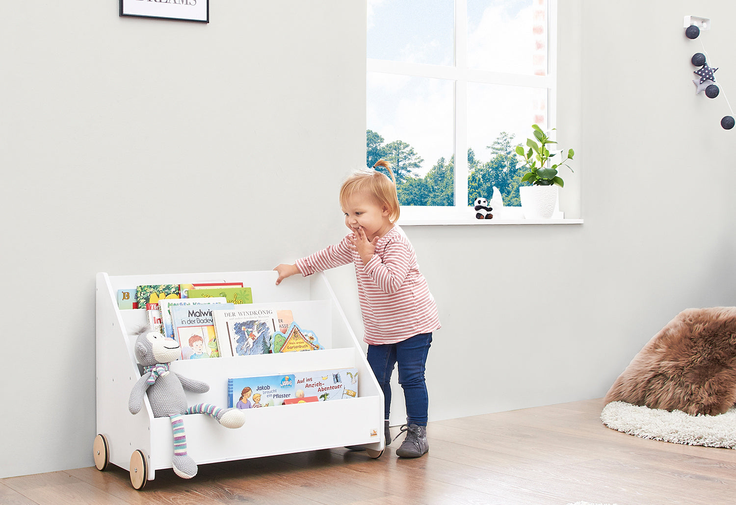 Bibliothèque enfant à roulettes « Lasse », blanche